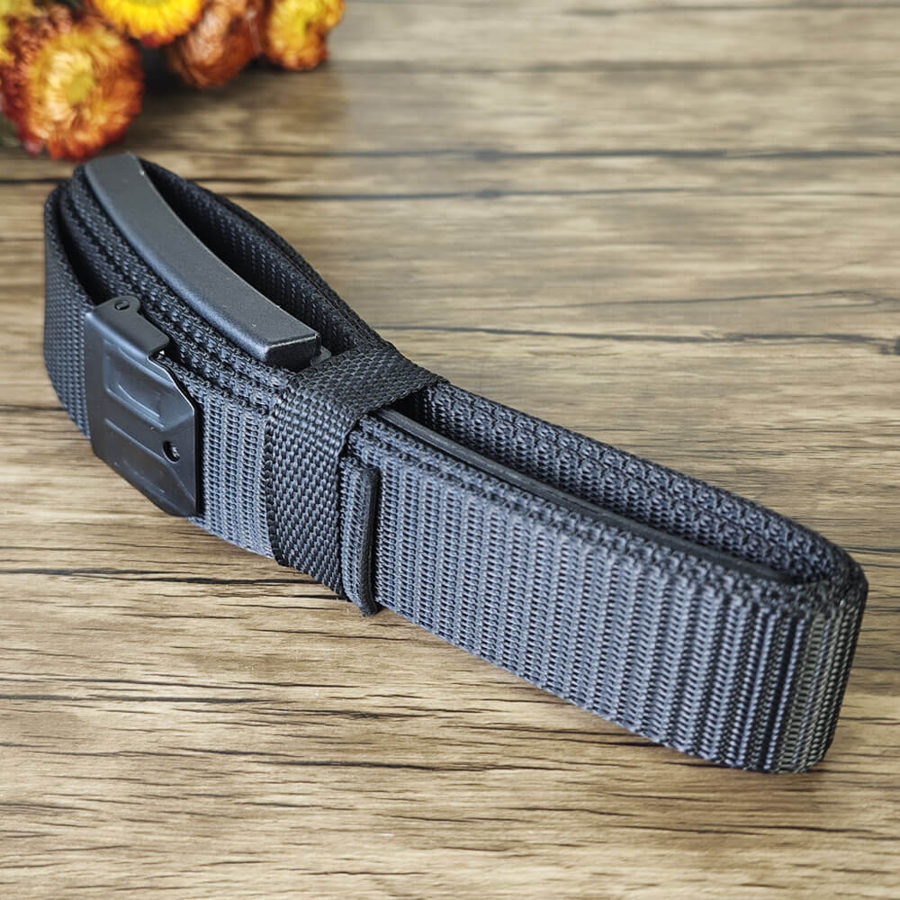 Black tactical braided belt with hidden buckle tool, one size fits most