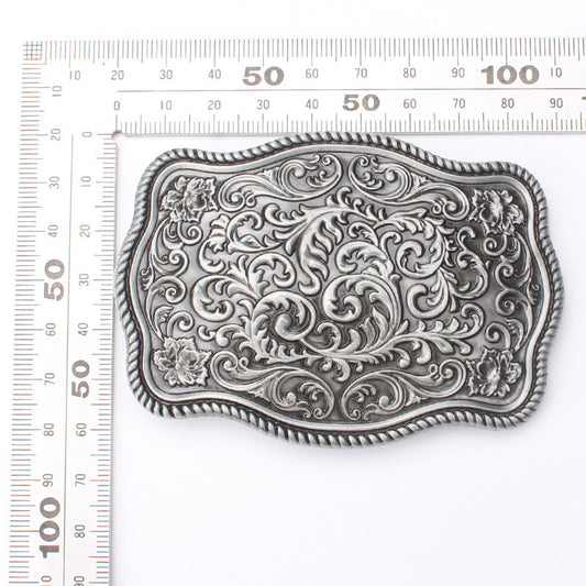 Arabic-style belt buckle with size reference for standard belts.