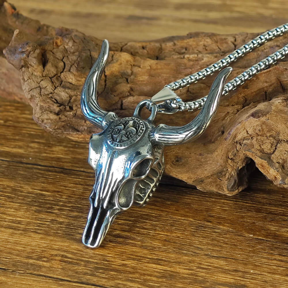 A silver necklace in the shape of a longhorn bull, western style