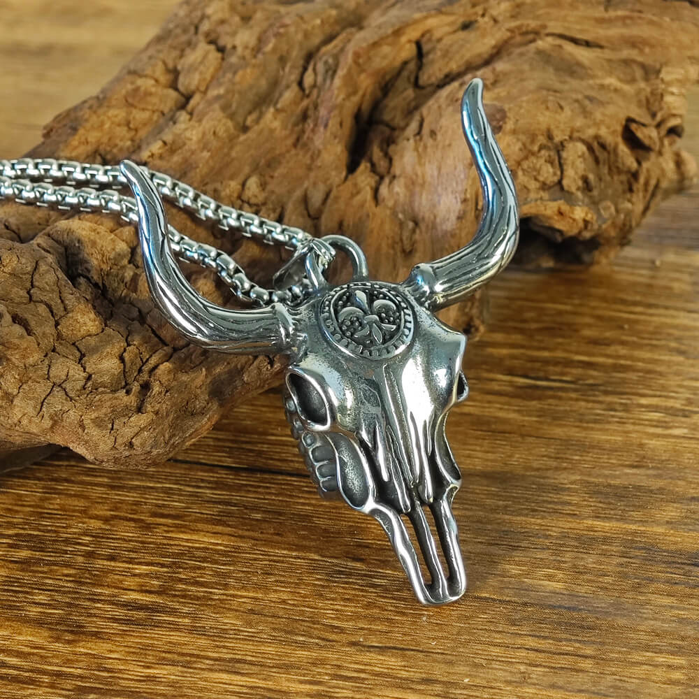 A silver necklace in the shape of a longhorn bull, western style