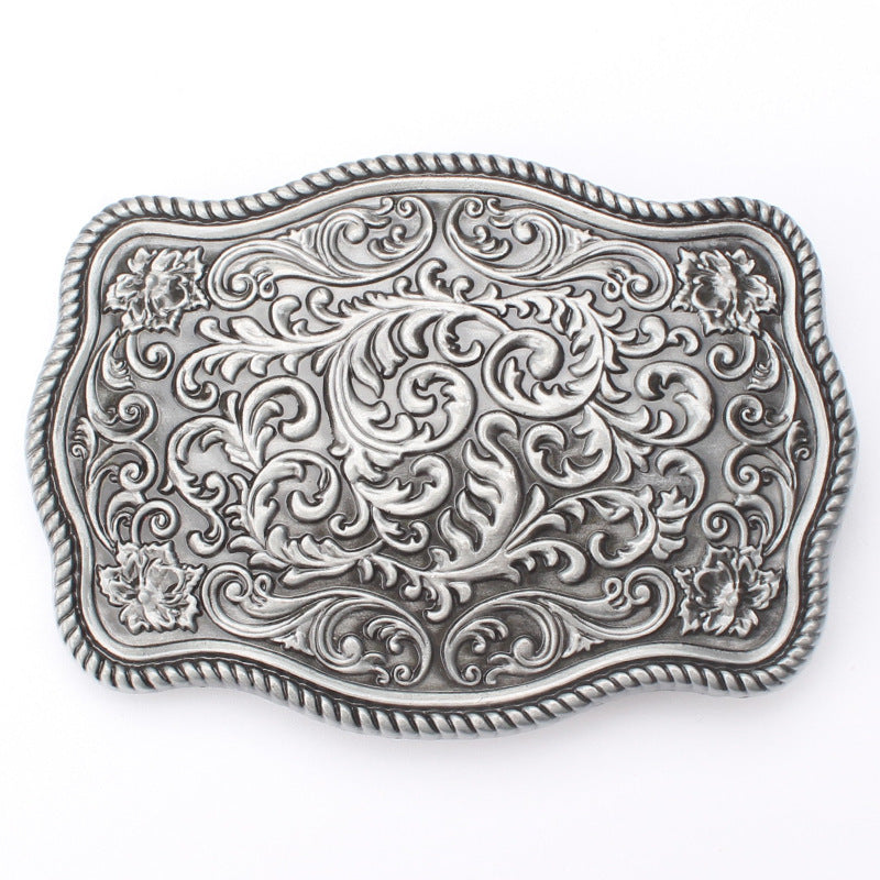Silver arabesque belt buckle in Arabic geometric floral style.