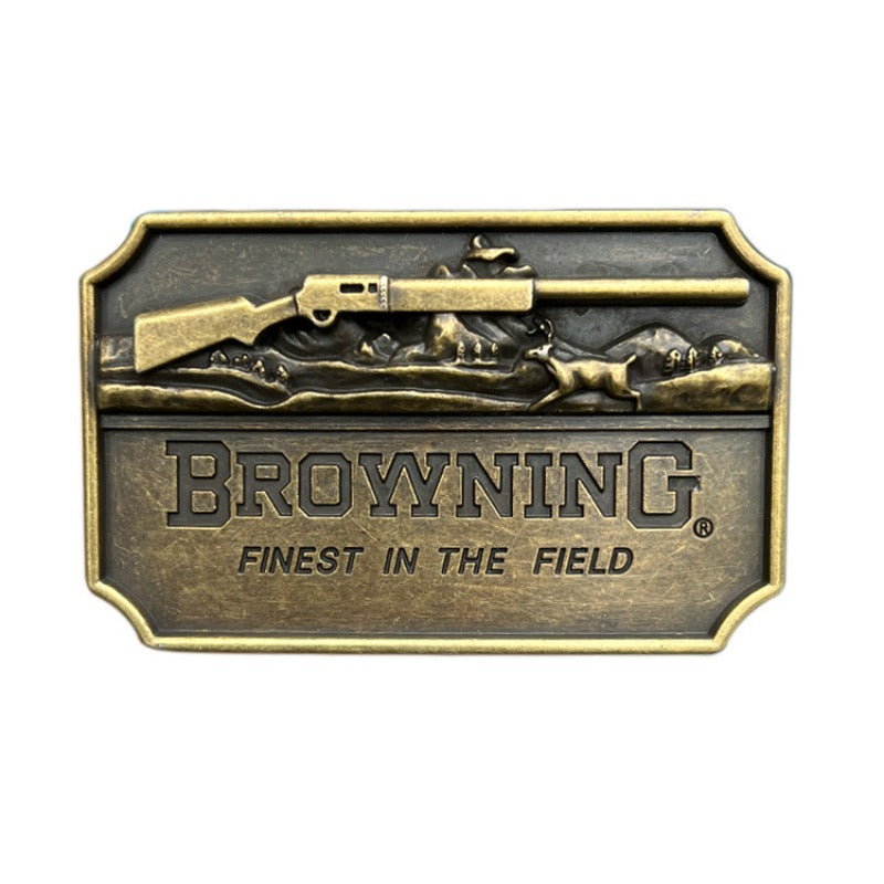 Front view of Browning shotgun-style belt buckle with detailed engraving and western design.