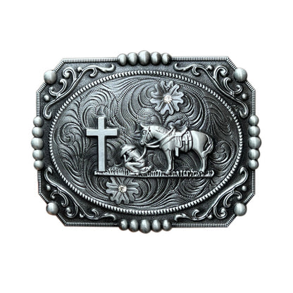 Silver cowboy prayer belt buckle with detailed engraving of cowboy kneeling at a cross with his horse.