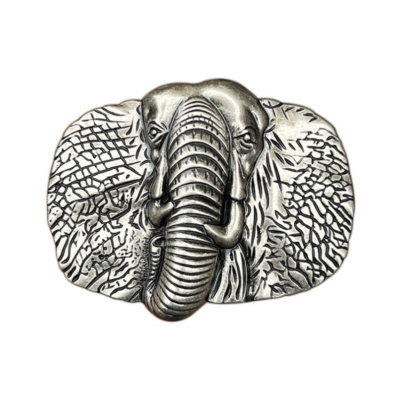 Silver western belt buckle with embossed elephant head and ornamental detailing.