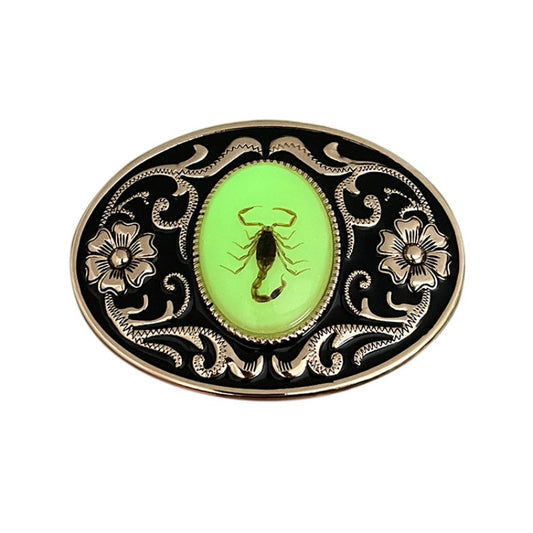 Gold belt buckle featuring luminous scorpion in bold rugged design.