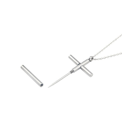Alternative angle of opened cross necklace revealing protective spike.
